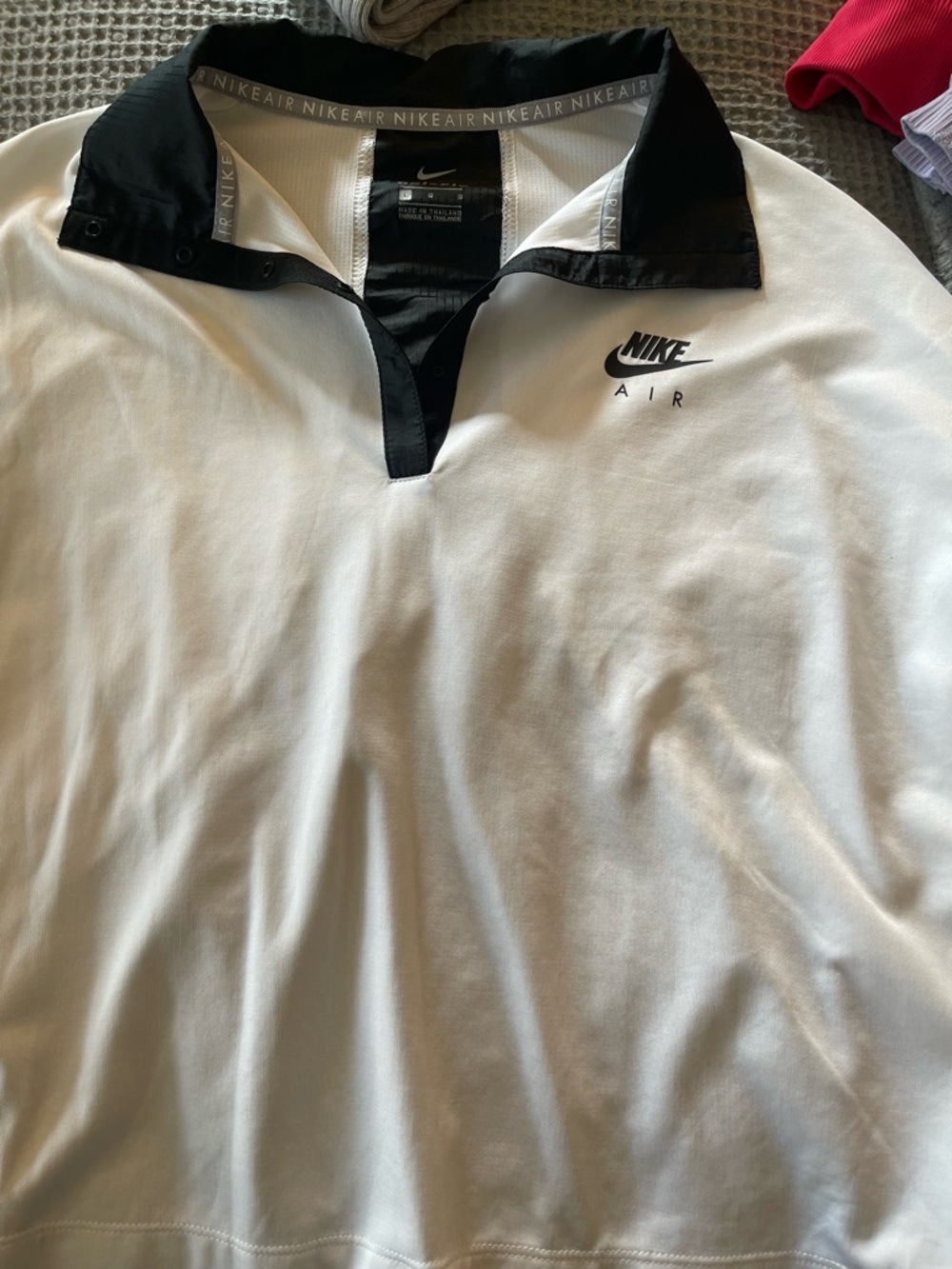Nike White Polo Shirt with Black Collar and Logo